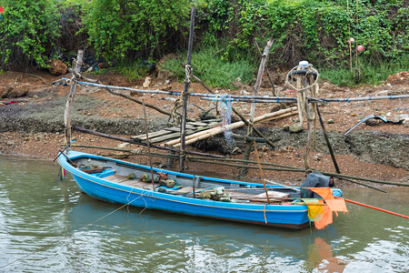 The small fishing boat parked in a small canalの写真素材