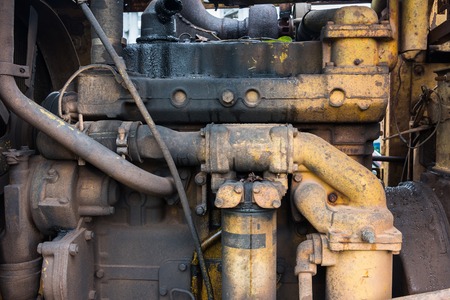 Diesel Engine of an old tractorの写真素材