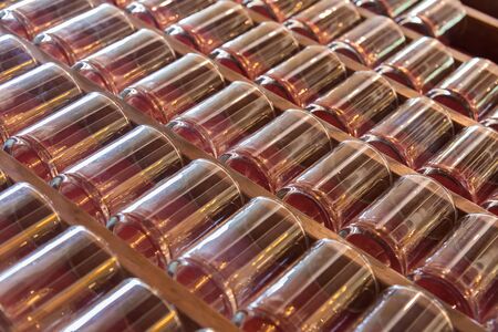 A row of glass drinking waterの写真素材