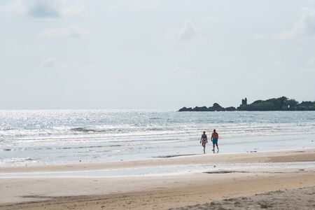 Trat, Thailand - May, 20, 2017 : Unidentified name man and woman walking on the Prao Beach in Koh Chang island Trat, Thailand.のeditorial素材