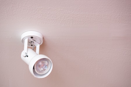 Close up of white lamp on the ceilingの写真素材