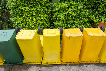 Yellow Large Trash Box on the floor at Wat Borom Raja Kanjanapisek Wat Leng Nei Yee 2 Templeの写真素材