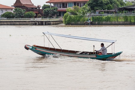 Nonthaburi, Thailand - June, 11, 2017 : Unidentified name people on boat transportation in Chaophraya river of Thailand at Kohkred Nonthaburi, Thailand.のeditorial素材