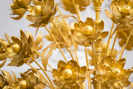 Brass flower in Wat Phra That Chaiyaphum Temple at Chaiyaphum, Thailandの写真素材