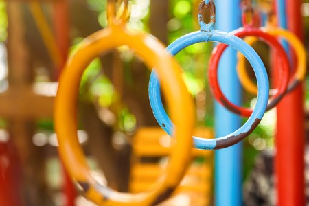 Hanging Climbing Rings In A Playground, colorful climbing ring.selective focusの写真素材