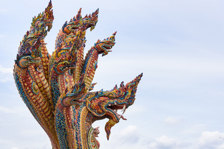 Nakhon Ratchasima, Thailand - July, 02, 2017 : The colorful multiple head Naka statue of Wat Ban Rai with mythology sculpture with glazed tile in Nakhonratchasima Province, Thailand.のeditorial素材
