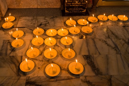 Phetchabun, Thailand - July, 15, 2017 : Burning candles at a Buddhist at kanchana pisek grand pagoda in Khao Kho Phetchabun Thailand.のeditorial素材