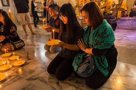 Phetchabun, Thailand - July, 15, 2017 : Unidentified name Mother and daughter bless the gods at kanchana pisek grand pagoda in Khao Kho Phetchabun Thailand.のeditorial素材