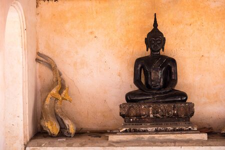 Ratchaburi, Thailand - July, 23, 2017 : Black Buddha statue in Wat Khanon at Ratchaburi, Thailandのeditorial素材