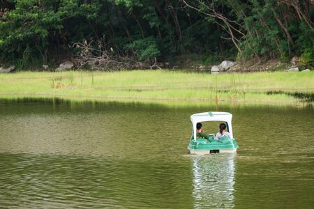Ratchaburi, Thailand - July, 23, 2017 : Unidentified name Tourist enjoy with pedal boat on the lake of Khao Hin Ngu Rock Park at Ratchaburi, Thailandのeditorial素材