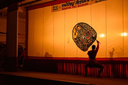 Ratchaburi, Thailand - July, 23, 2017 : Unidentified name Man showt large shadow play is performed in Wat Khanon temple at Ratchaburi, Thailandのeditorial素材
