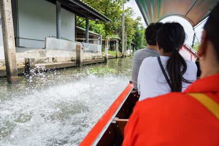 Bangkok, Thailand - July, 30, 2017 : Unidentified name foreign tourists visiting by boat in Khlong Lat Mayom Floating Market Bangkok, Thailand.のeditorial素材