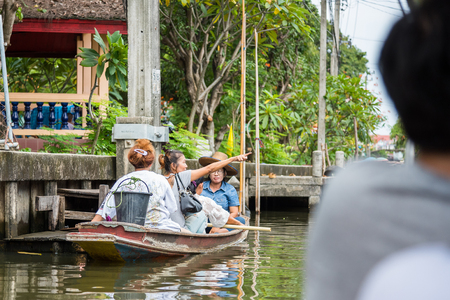 Bangkok, Thailand - July, 30, 2017 : Unidentified name foreign tourists visiting by boat in Khlong Lat Mayom Floating Market Bangkok, Thailand.のeditorial素材