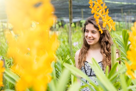 Bangkok, Thailand - July, 30, 2017 : Unidentified name Young woman tourists take a portraiture in the orchid farm at Bangkok, Thailand.のeditorial素材