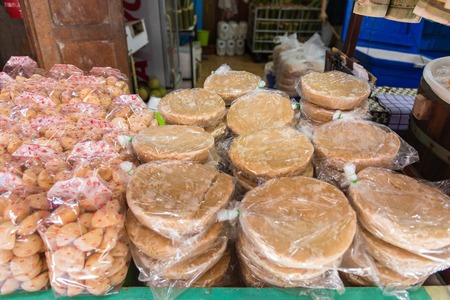 The palm sugar or Jaggery in the market of Thailandの写真素材