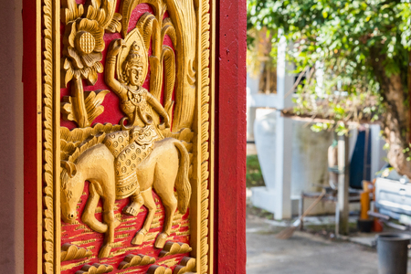 Buddhist carvings on the windows of the church in Rongngae temple at Nan Province, Thailandの写真素材