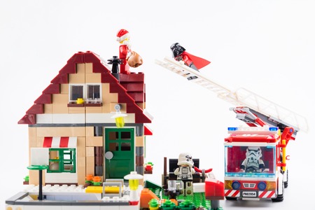 Nonthaburi, Thailand - November, 07, 2017 : Lego Darth vader climbing the ladder of a fire truck help Lego Santa get down from the roof on christmas day.Concept christmas day.のeditorial素材