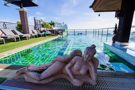 Prachuab Khirikhan, Thailand - November, 26, 2017 : Swimming pool on the rooftop building with city and sky background at Hua Hin city Prachuab Khirikhan, Thailandのeditorial素材