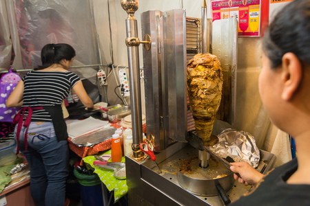 Prachuab Khirikhan, Thailand - November, 25, 2017 : Cutting Beef Turkish food Doner Kebab at Seafood Market Huahin Prachuab Khirikhan, Thailandのeditorial素材