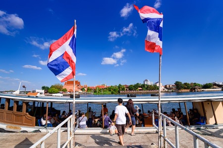 Nonthaburi, Thailand - December, 17, 2017 : Unidentified name going to board a boat for a ferry transportation in Chaophraya river of Thailand at Kohkred Nonthaburi, Thailand.のeditorial素材