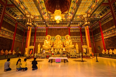 Nonthaburi, Thailand - December, 31, 2017 : Golden Buddha Statue to pray inside Leng Noei Yi 2 chinese temple at Nonthaburi, Thailandのeditorial素材