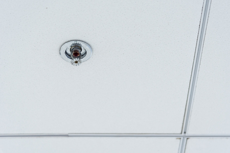 Fire sprinkler system on ceilingの写真素材