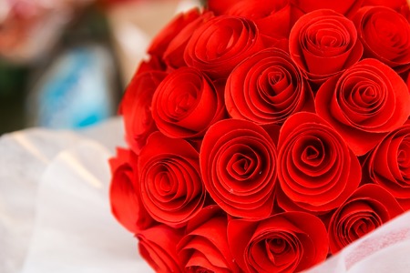 Artificial paper rose flowers backgroundの写真素材