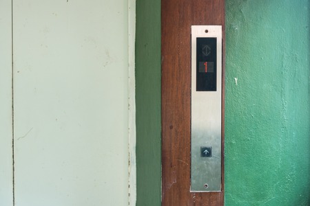 Lift with buttons on vintage background.Thailand