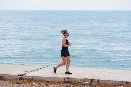 Prachuab Khirikhan, Thailand - March, 25, 2018 : Unidentified name people are exercising healthy by the sea in the morning of the day at Prachuab Khirikhan, Thailandのeditorial素材