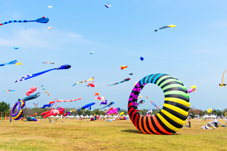 Prachuab Khirikhan, Thailand - March, 25, 2018 : Various colorful kites flying in the sky during a kite festival at Prachuab Khirikhan, Thailandのeditorial素材