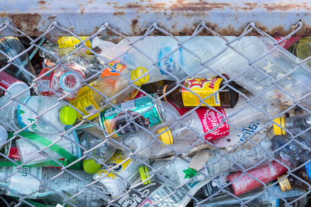 Chachoengsao, Thailand - April, 15, 2018 : Close-up view plastic bottles of various drinks in the trash at Wat Hong Thong Chachoengsao, Thailandのeditorial素材