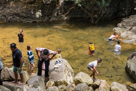 Chanthaburi, Thailand - April, 27, 2018 : Unidentified name people visitors come to play water at Chanthaburi Waterfall National Park(Pliw waterfall) Chantaburi province, Thailandのeditorial素材