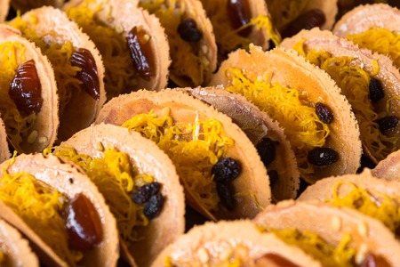 Khanom Beaung Thai or a kind of filled pancake Thai food or Thai Style Crisp Tart on tray, Thailand