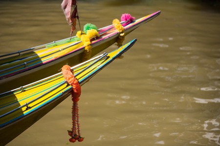 Garlands for good luck at the heading of the boat.Thailand