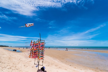 Prachuap Khiri Khan,Thailand - June, 03, 2018 : Unidentified name Girl selling foam air plane beside the beach at Hua Hin beach Prachuab Khirikhan, Thailandのeditorial素材