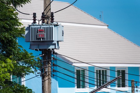 Ratchaburi,Thailand - June, 02, 2018 : Power Transformer on the power poles at Damnoen Saduak Floating Market is one of the most popular floating markets in Ratchaburi,Thailandのeditorial素材