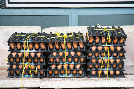 Fresh eggs on egg panel package from a chicken farm in the package retained to sell for cooking at the market.Thailandの写真素材