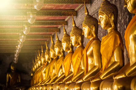 Golden Buddha Statue of Wat Suthat Devaravaram temple landmark of Bangkok, Thailandの写真素材