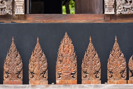 Wood carved of Pearl House in Baandam.Thailandの写真素材