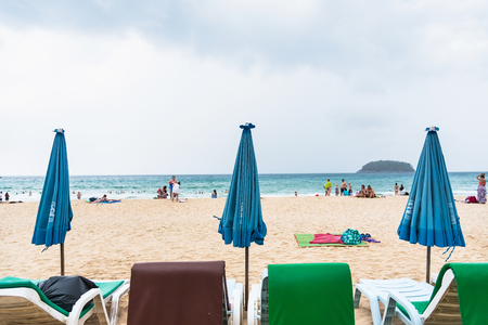 Phuket, Thailand - March, 29, 2019 : Unidentified name People on summer beach at tropical Phuket island in Thailand. Landscape taken on main long beach with blue sky and white sand.Phuket, Thailandのeditorial素材