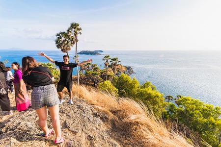 Phuket, Thailand - March, 29, 2019 : Unidentified name tourists come to one of the beautiful scenic spots at sunset by the sea at Promthep Cape, the beautiful sea, Phuket, Thailandのeditorial素材
