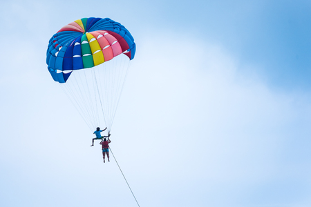Phuket, Thailand - March, 29, 2019 : Unidentified name tourist sea parasailing water.Flying on a parachute behind a boat on a summer holiday by the sea at Patong beach in Phuket, Thailandのeditorial素材