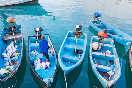 Phuket, Thailand - March, 30, 2019 : Small boats moored in morning time at Chalong port, Main port for travel ship to krabi and phi phi island, Phuket, Thailandのeditorial素材