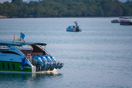 Phuket, Thailand - March, 30, 2019 : Many boats moored in sunrise morning time at Chalong port, Main port for travel ship to krabi and phi phi island, Phuket, Thailandのeditorial素材