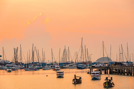 Phuket, Thailand - March, 30, 2019 : Many boats moored in sunrise morning time at Chalong port, Main port for travel ship to krabi and phi phi island, Phuket, Thailandのeditorial素材