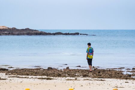 Rayong, Thailand - May, 12, 2019 : Unidentified name Man Alone on the Vongdeuan beach in morning sunrise the Koh Samet island, Rayong, Thailandのeditorial素材