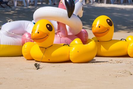 Rayong, Thailand - May, 10, 2019 : Yellow Duck swim tube on the beach Inflatable duck.Fantasy Swim Ring for Summer sea Trip on the beach at the Koh Samet island, Rayong, Thailandのeditorial素材