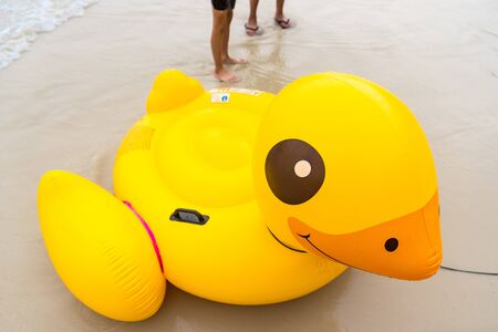 Rayong, Thailand - May, 10, 2019 : Yellow Duck swim tube on the beach Inflatable duck.Fantasy Swim Ring for Summer sea Trip on the beach at the Koh Samet island, Rayong, Thailandのeditorial素材