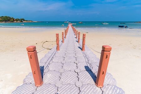 Rayong, Thailand - May, 10, 2019 : Boat jetty island stretches out into the sea at Vongdeuan beach sunset in the Koh Samet island, Rayong, Thailandのeditorial素材