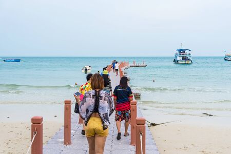 Rayong, Thailand - May, 10, 2019 : Unidentified name People on Boat jetty island stretches out into the sea at Vongdeuan beach sunset in the Koh Samet island, Rayong, Thailandのeditorial素材